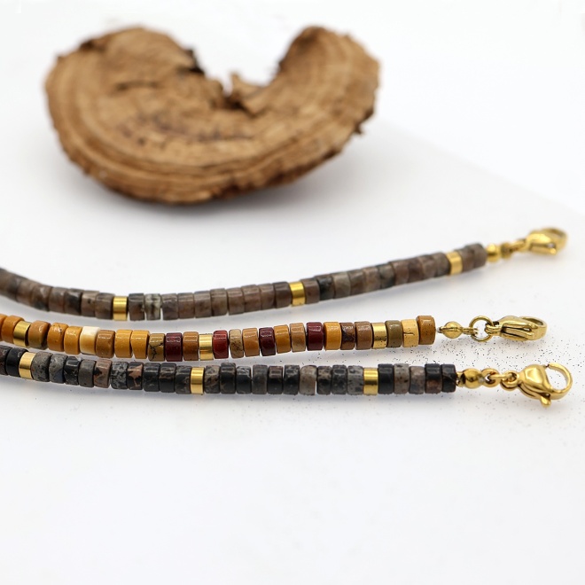 trio_van_drie_armbanden_met_stenen_kralen_en_stainless_steel_vergulding_2109101086